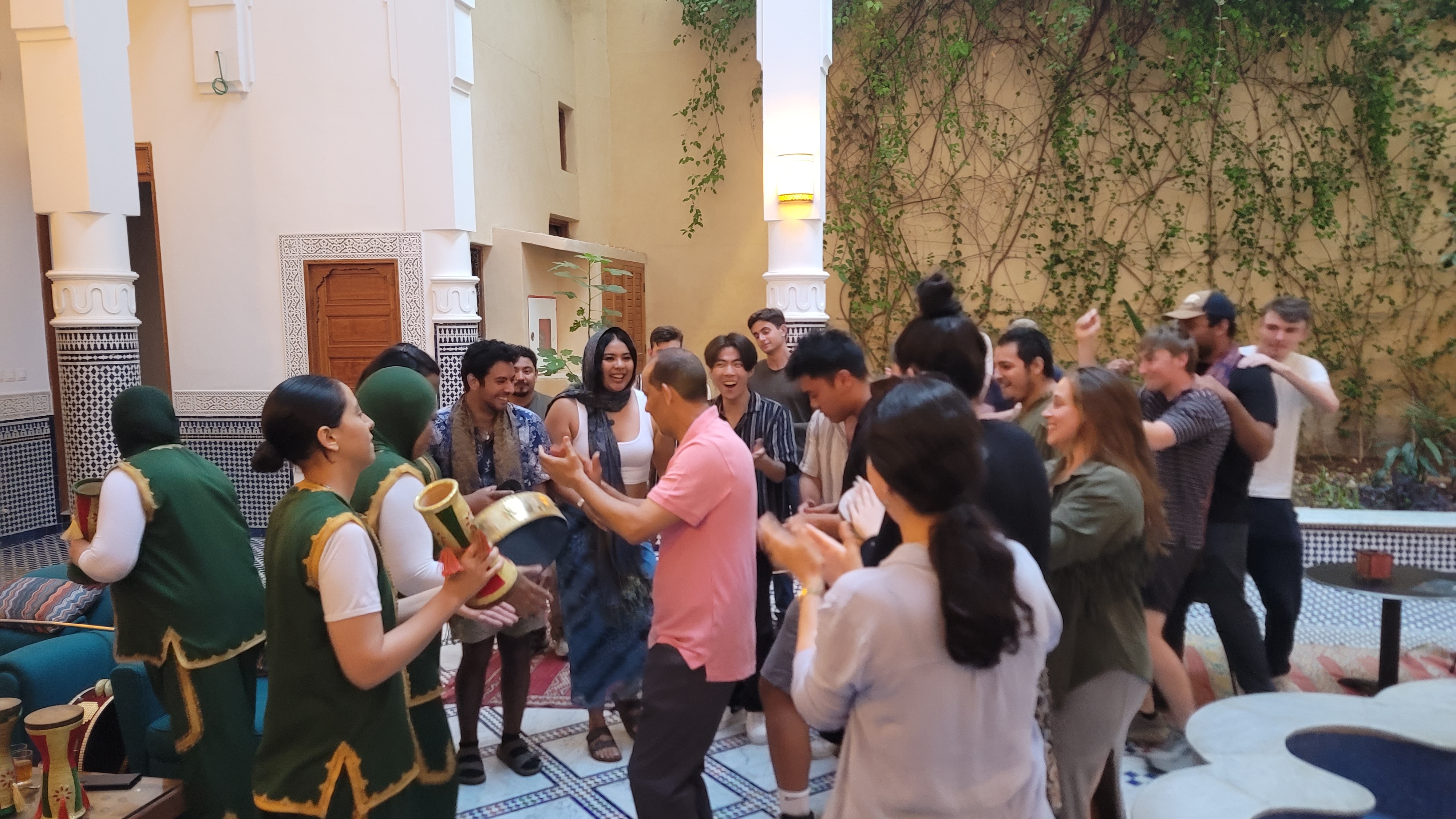 Professor Bachkar and group dancing at the Fez Medina